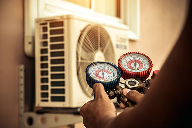 Professional Hvac technician working in Owensville, MO